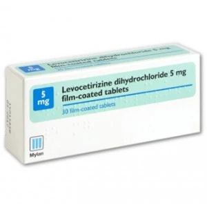 Levocetirizine 5mg film-coated tablets front view showing white oval tablets with G breakline